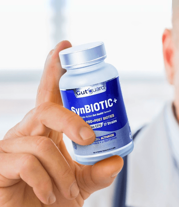 GutGuard SynBIOTIC+ bottle held in hand